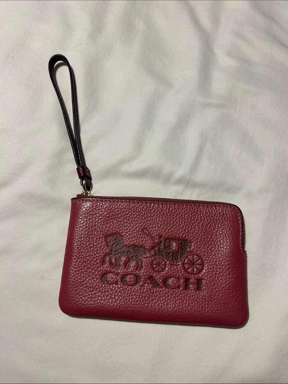 Coach Burgundy Leather Wristlet with Black Strap